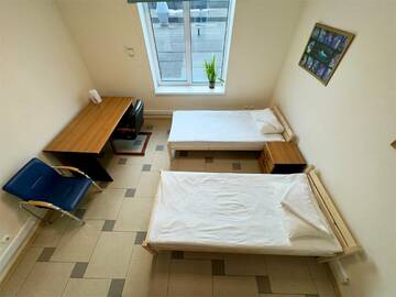 Двухместная комната c 2 односпальными кроватями с электронным замком в Хостеле Невский