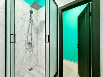 Кровать в общем номере для мужчин с 4 кроватями в Хостеле Невский