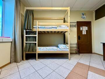 Кровать в общем номере для мужчин с 4 кроватями в Хостеле Невский